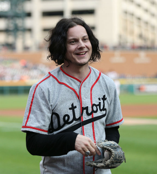 Illustration for article titled Jack White Proves He Can Smile AND Enjoy Baseball
